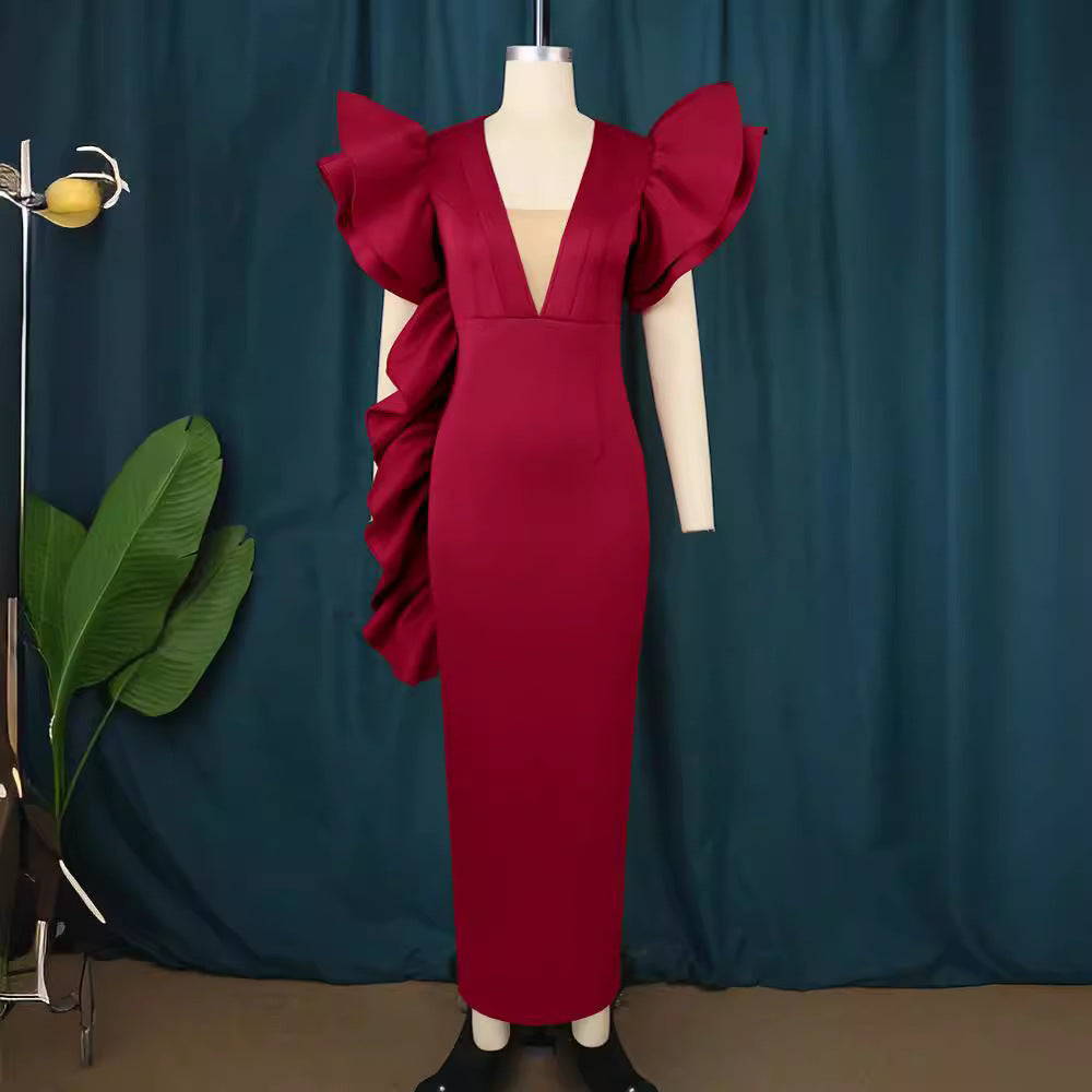 Dame figurformande aftonklänning med voluminösa volangärmar Mirla-Eva Jonsson