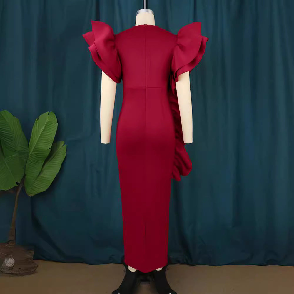 Dame figurformande aftonklänning med voluminösa volangärmar Mirla-Eva Jonsson