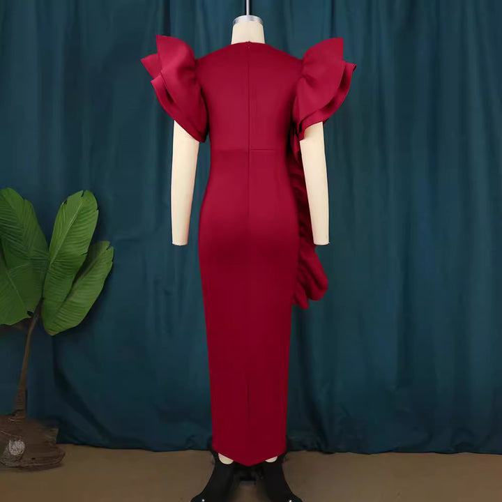 Dame figurformande aftonklänning med voluminösa volangärmar Mirla-Eva Jonsson