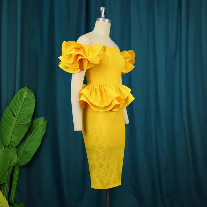 Dame figurnära cocktailklänning med voluminösa rynkade ärmar Mirla-Eva Jonsson