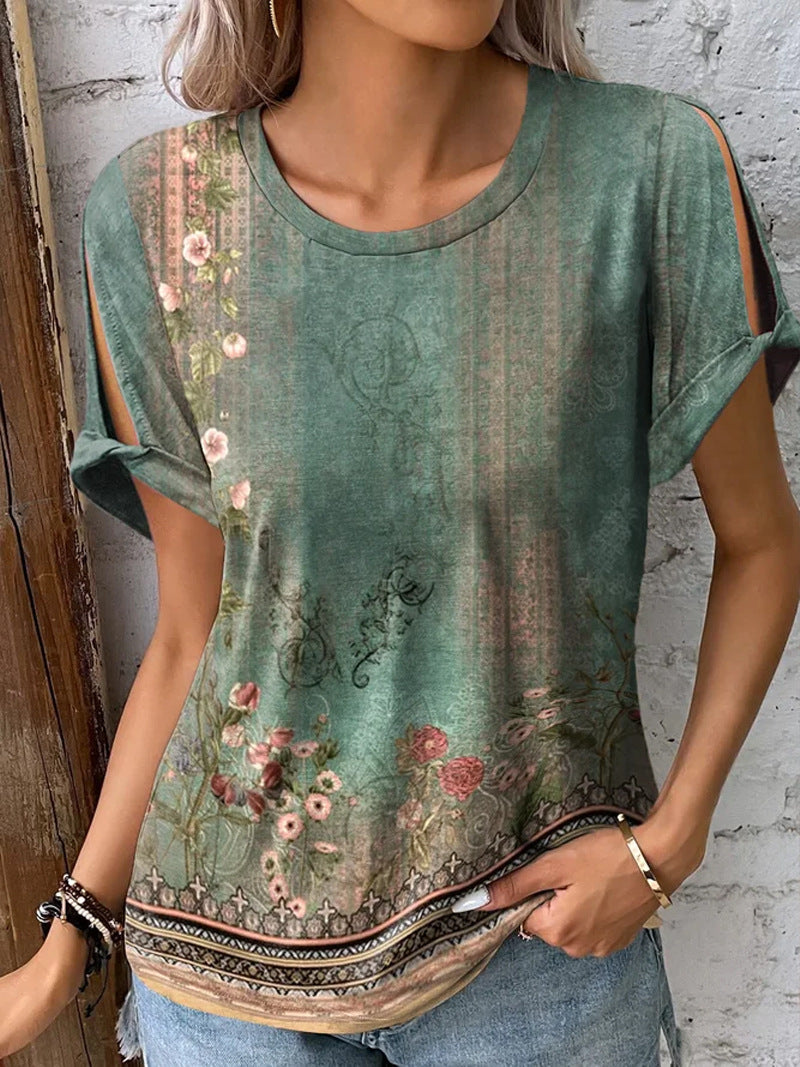 Dame floral oversized t-shirt med cut-out ärmar Mirla-Eva Jonsson