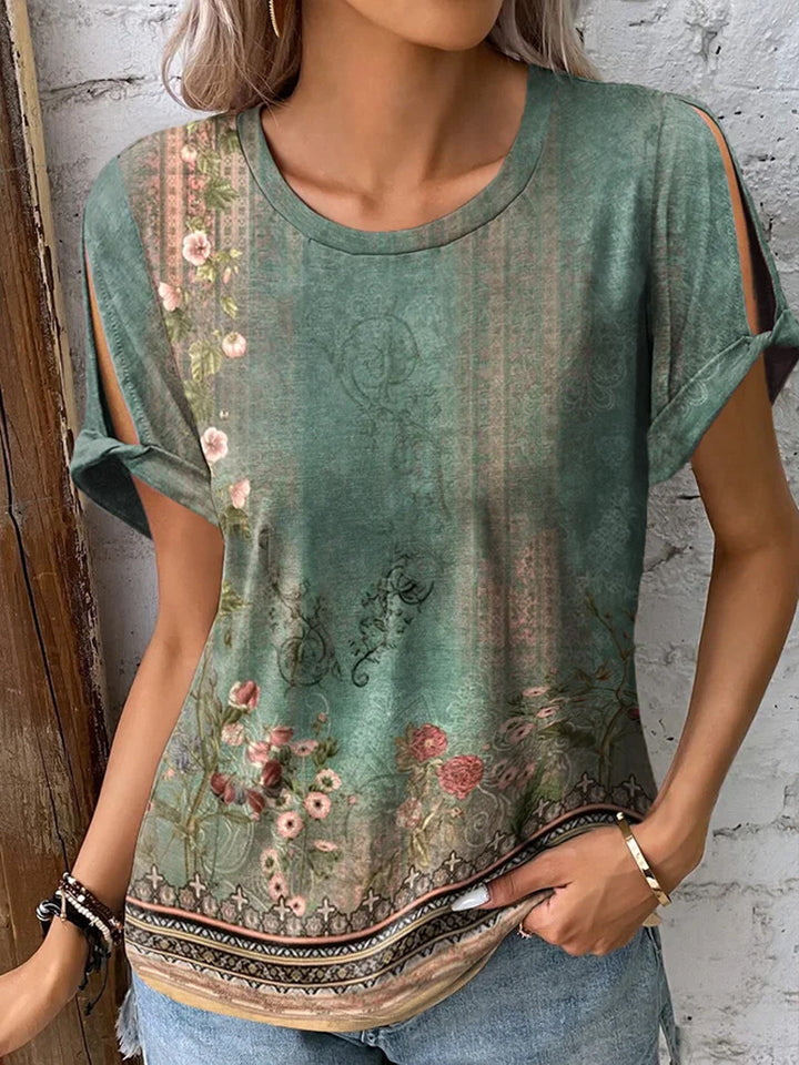 Dame floral oversized t-shirt med cut-out ärmar Mirla-Eva Jonsson