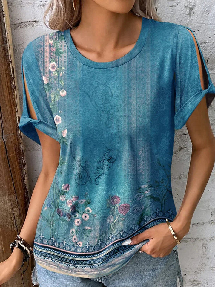 Dame floral oversized t-shirt med cut-out ärmar Mirla-Eva Jonsson
