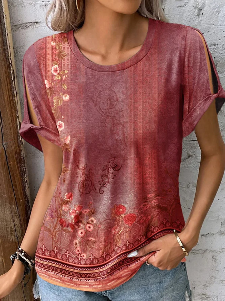 Dame floral oversized t-shirt med cut-out ärmar Mirla-Eva Jonsson