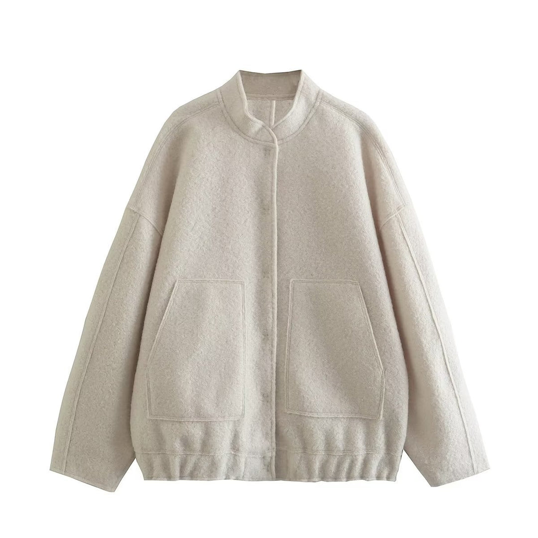 Dame fluffig oversized jacka med praktiska fickor och elegant ståkrage Mirla-Eva Jonsson