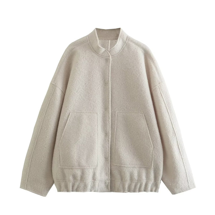 Dame fluffig oversized jacka med praktiska fickor och elegant ståkrage Mirla-Eva Jonsson