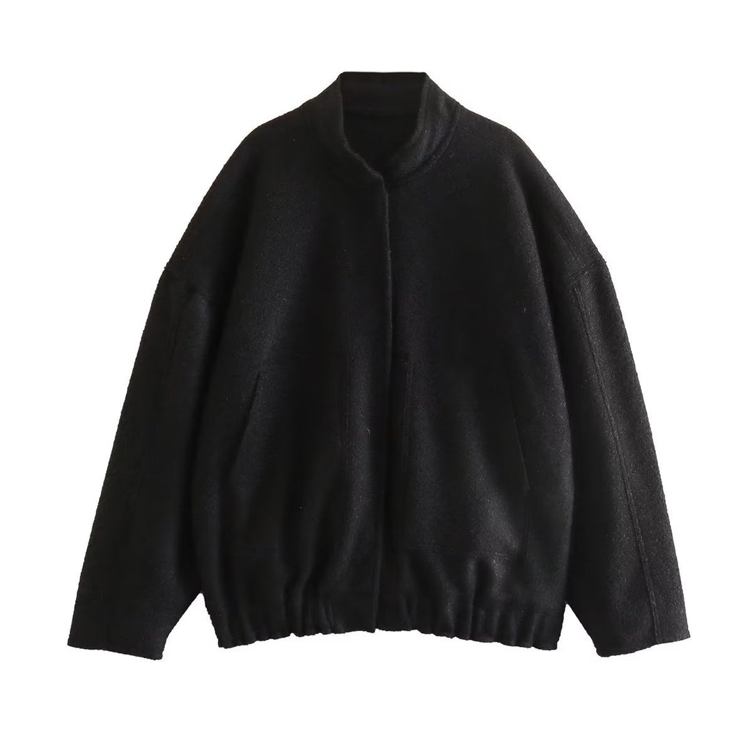 Dame fluffig oversized jacka med praktiska fickor och elegant ståkrage Mirla-Eva Jonsson