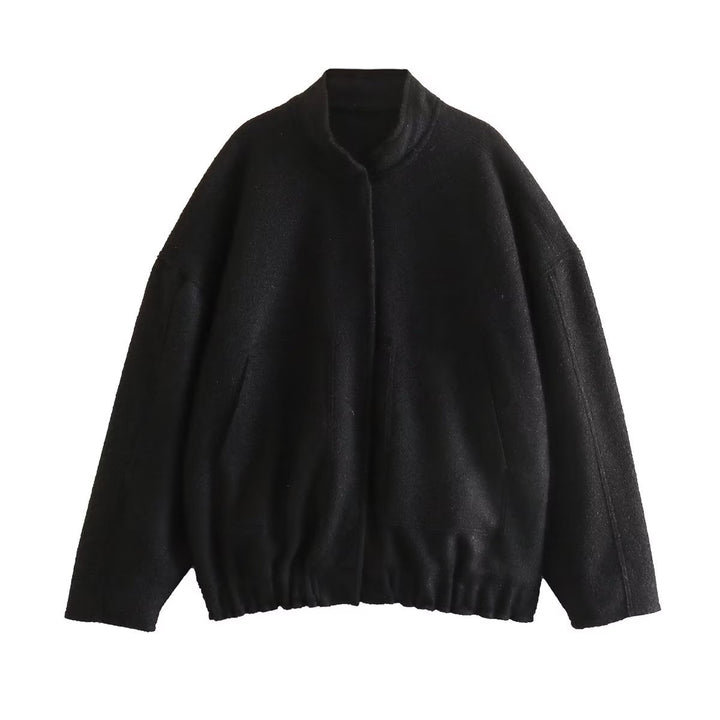 Dame fluffig oversized jacka med praktiska fickor och elegant ståkrage Mirla-Eva Jonsson