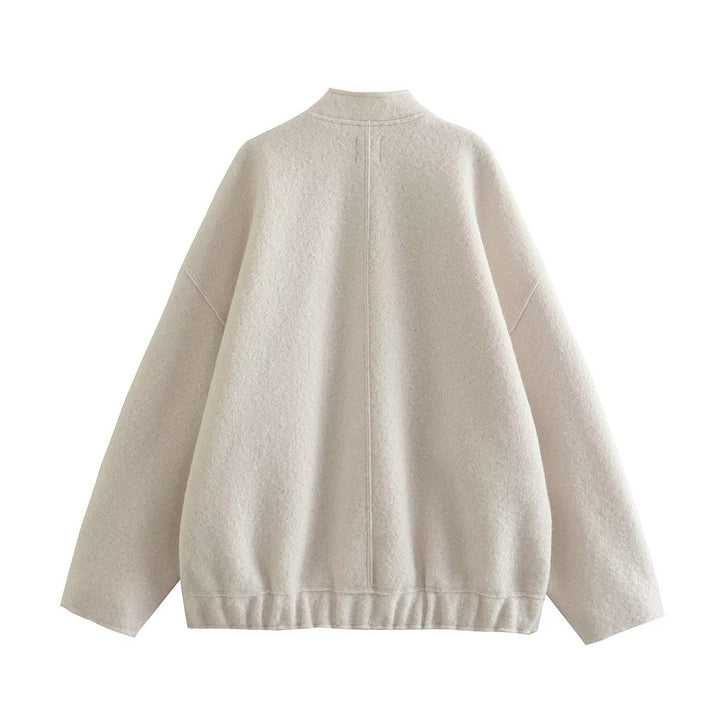 Dame fluffig oversized jacka med praktiska fickor och elegant ståkrage Mirla-Eva Jonsson
