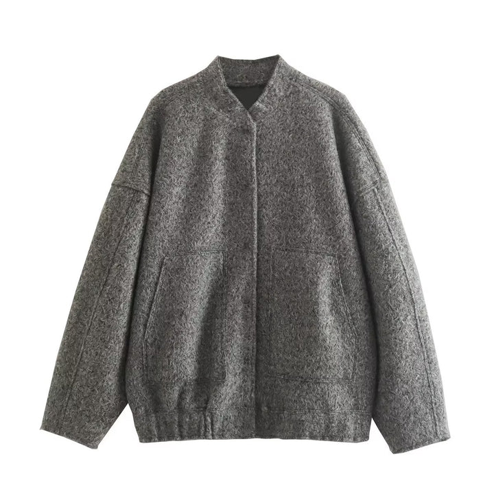 Dame fluffig oversized jacka med praktiska fickor och elegant ståkrage Mirla-Eva Jonsson