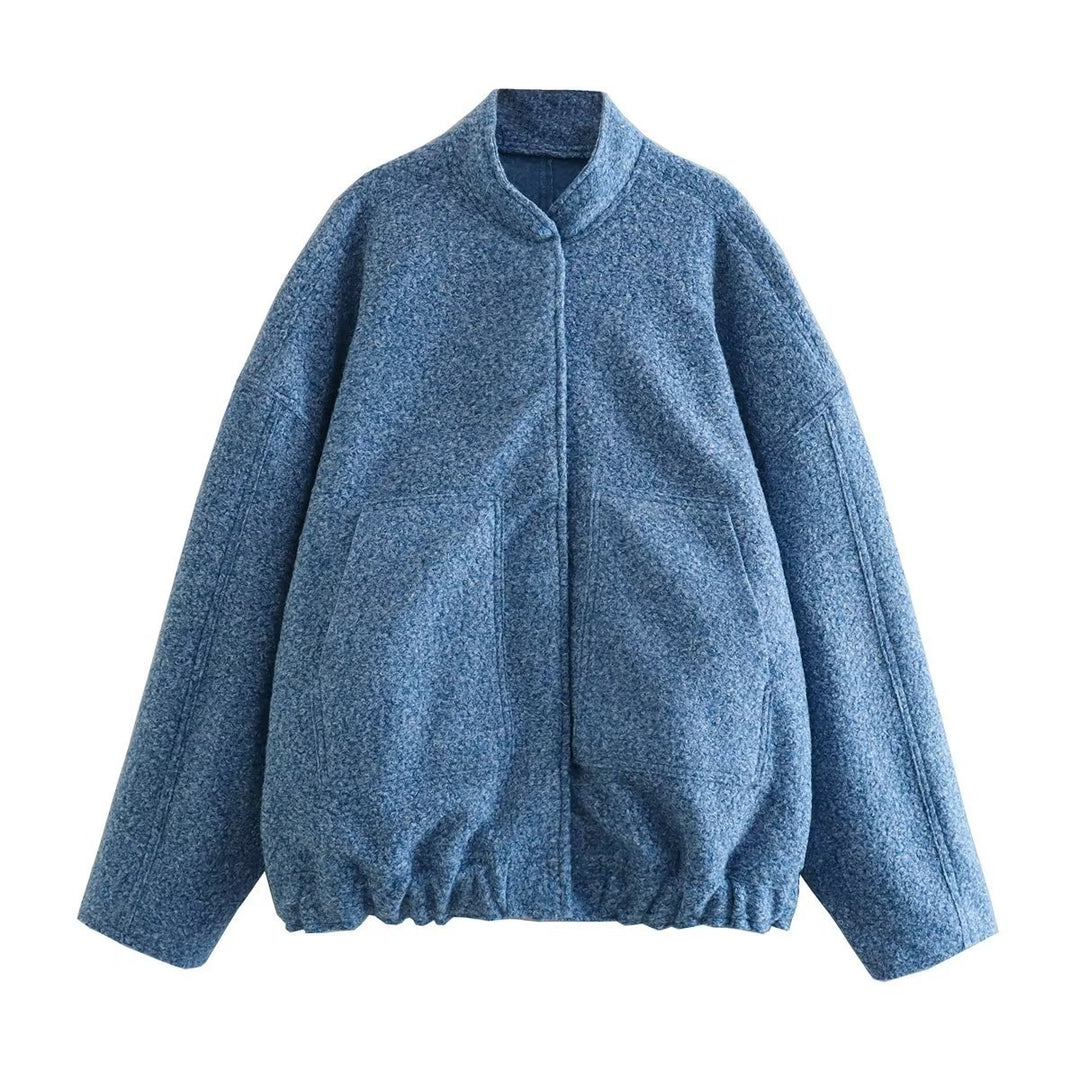 Dame fluffig oversized jacka med praktiska fickor och elegant ståkrage Mirla-Eva Jonsson