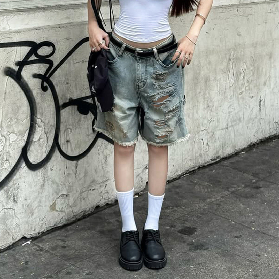 Dame förstörda denimshorts med hög midja och fransade kanter Mirla-Eva Jonsson