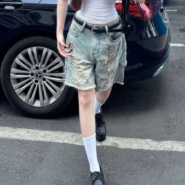 Dame förstörda denimshorts med hög midja och fransade kanter Mirla-Eva Jonsson