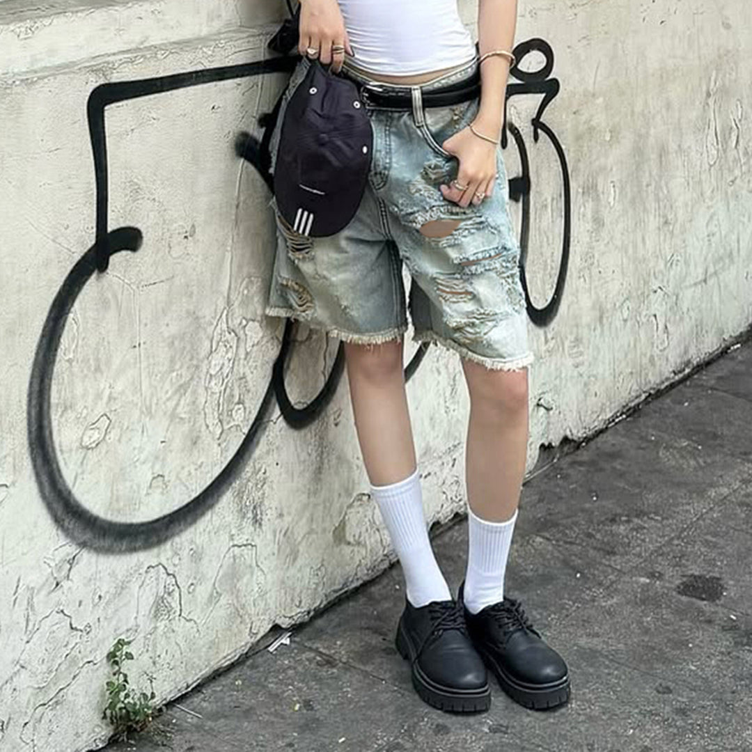 Dame förstörda denimshorts med hög midja och fransade kanter Mirla-Eva Jonsson