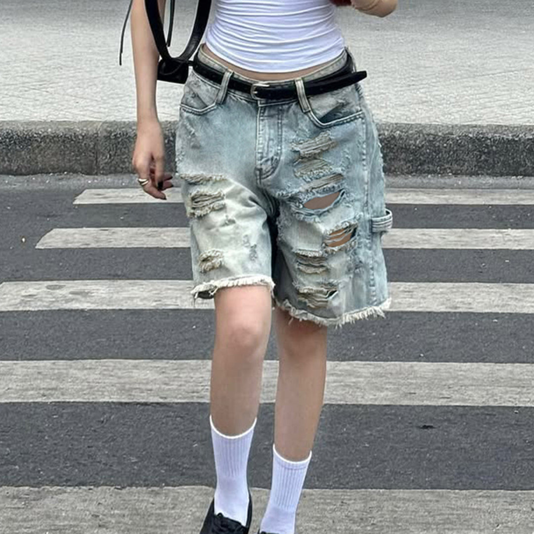 Dame förstörda denimshorts med hög midja och fransade kanter Mirla-Eva Jonsson