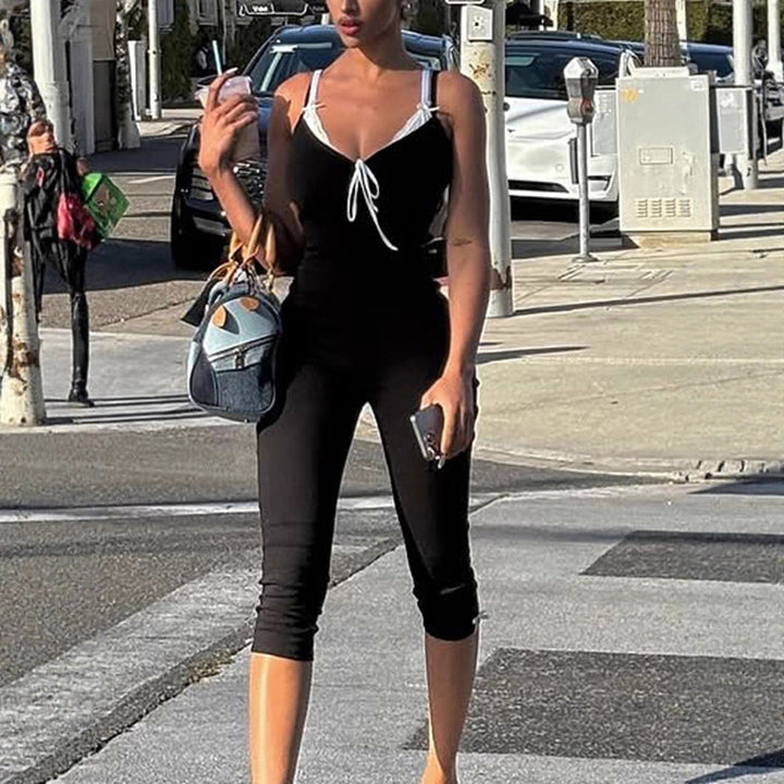 Dame golvlång jumpsuit med fina volangdetaljer och justerbara remmar Mirla-Eva Jonsson