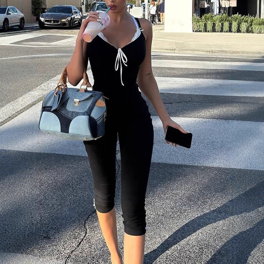 Dame golvlång jumpsuit med fina volangdetaljer och justerbara remmar Mirla-Eva Jonsson