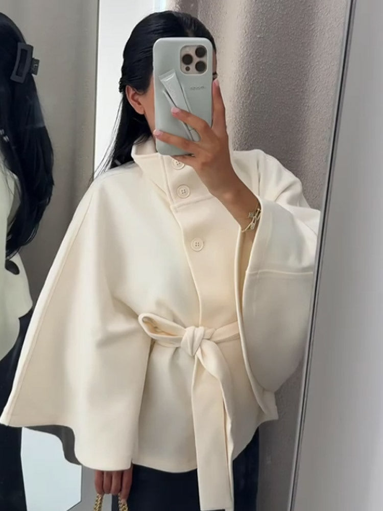 Dame hooded coat with fashionable belt and voluminous sleeves Mirla-Eva Jonsson