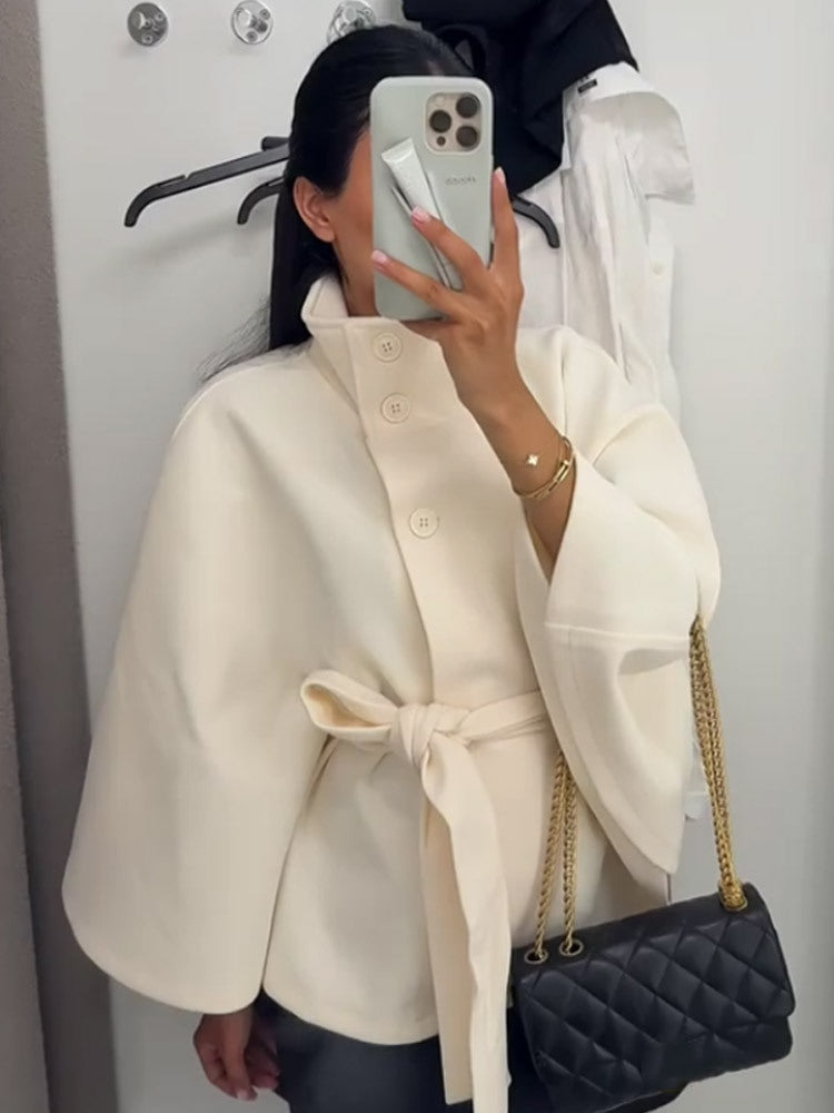 Dame hooded coat with fashionable belt and voluminous sleeves Mirla-Eva Jonsson