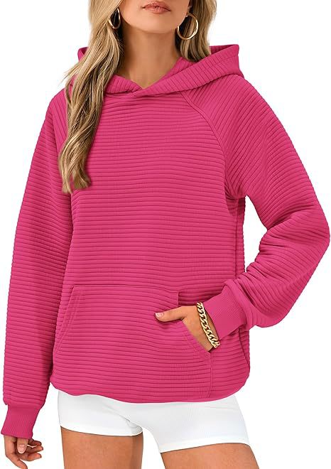 Dame hoodie med strukturerad yta och praktisk känguruficka Eva Jonsson-Eva Jonsson