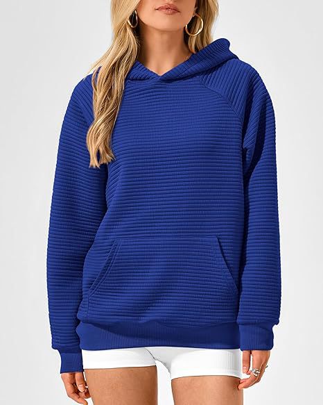 Dame hoodie med strukturerad yta och praktisk känguruficka Eva Jonsson-Eva Jonsson