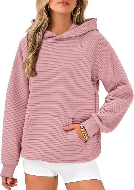 Dame hoodie med strukturerad yta och praktisk känguruficka Eva Jonsson-Eva Jonsson