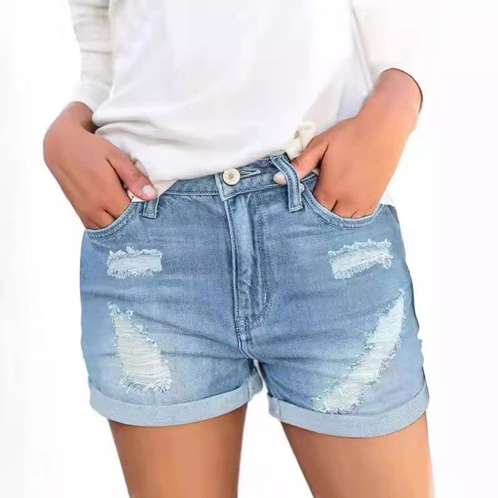 Dame jeansshorts med moderiktiga reavskärningar och avslappnad passform Mirla-Eva Jonsson