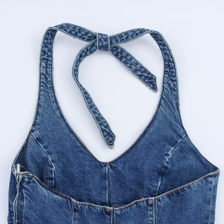 Dame jumpsuit i denim med korsremmar Mirla-Eva Jonsson