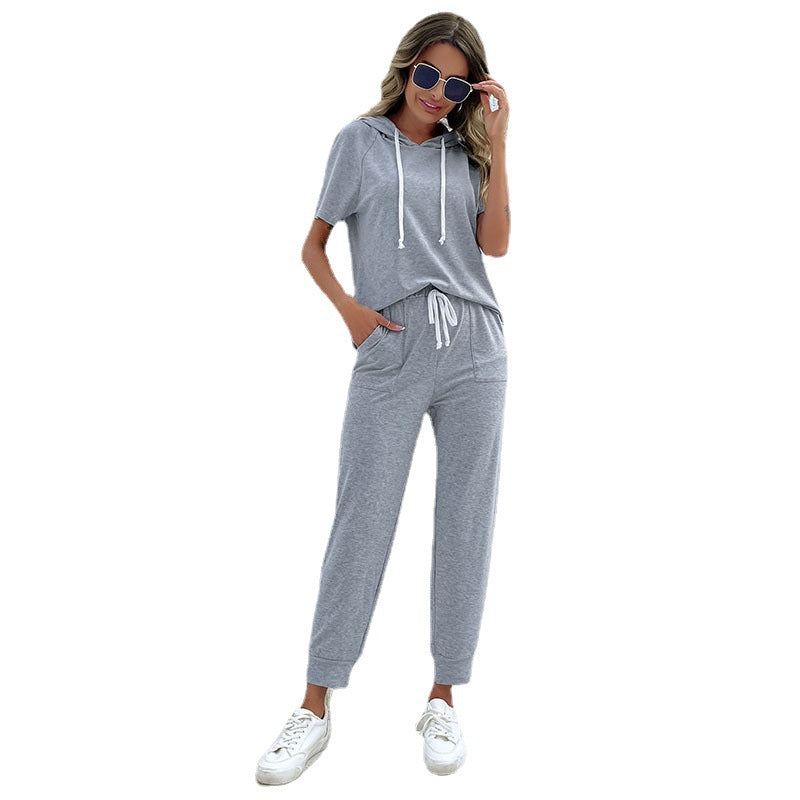 Dame jumpsuit med bekväm dragsko och avslappnad kortärmsdesign Mirla-Eva Jonsson