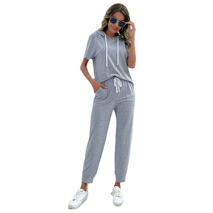 Dame jumpsuit med bekväm dragsko och avslappnad kortärmsdesign Mirla-Eva Jonsson