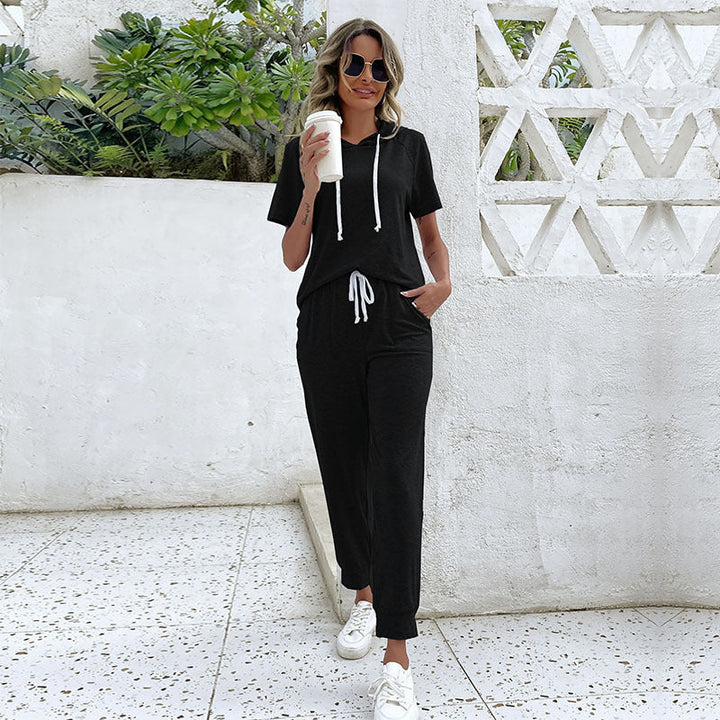 Dame jumpsuit med bekväm dragsko och avslappnad kortärmsdesign Mirla-Eva Jonsson