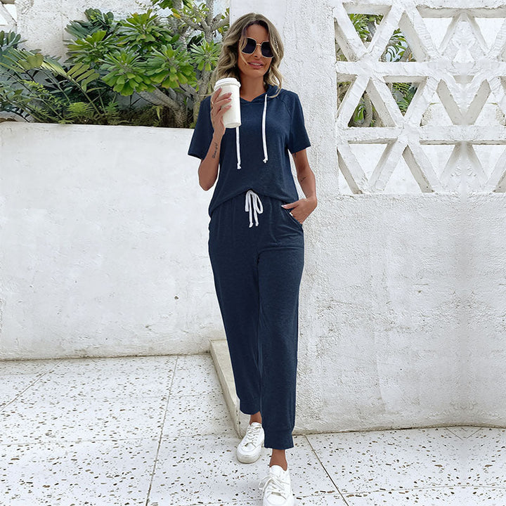 Dame jumpsuit med bekväm dragsko och avslappnad kortärmsdesign Mirla-Eva Jonsson