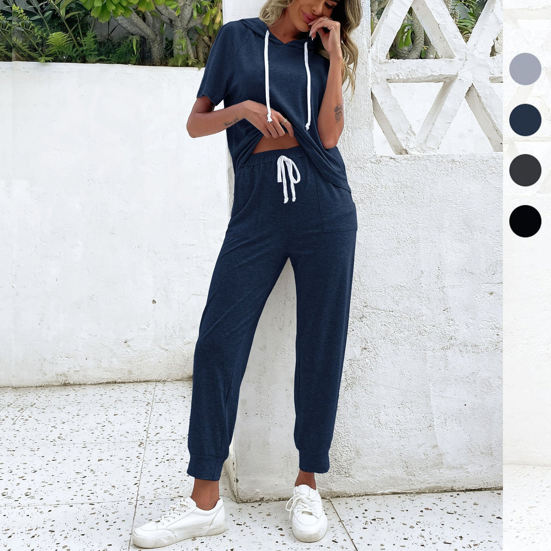 Dame jumpsuit med bekväm dragsko och avslappnad kortärmsdesign Mirla-Eva Jonsson
