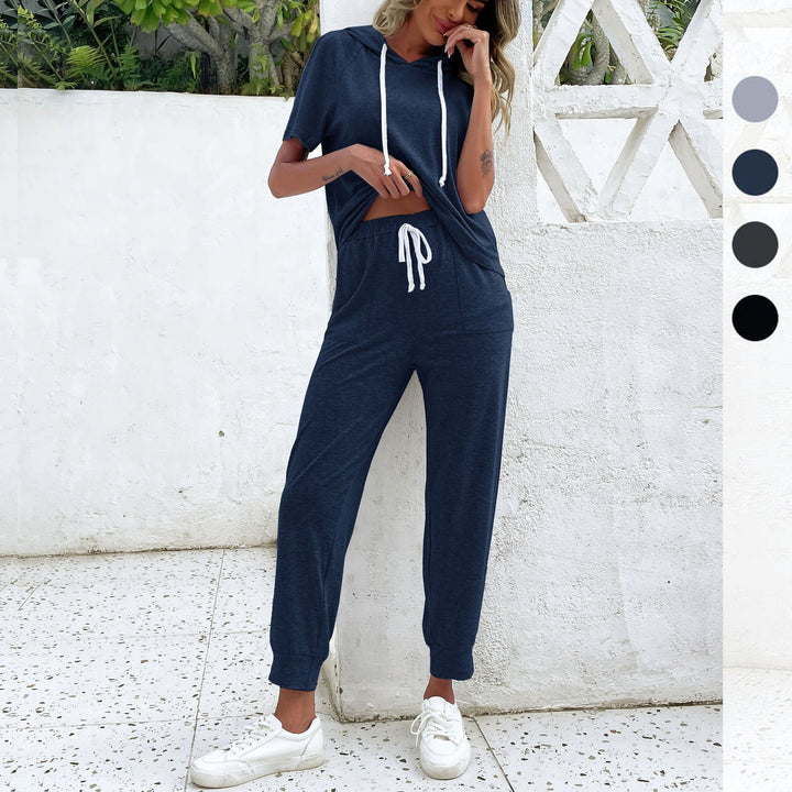 Dame jumpsuit med bekväm dragsko och avslappnad kortärmsdesign Mirla-Eva Jonsson