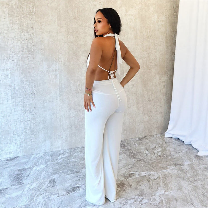Dame jumpsuit med elegant inverkningsdetalj och vida benpartier Mirla-Eva Jonsson