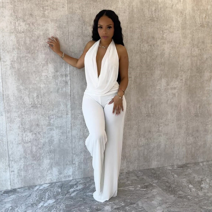 Dame jumpsuit med elegant inverkningsdetalj och vida benpartier Mirla-Eva Jonsson
