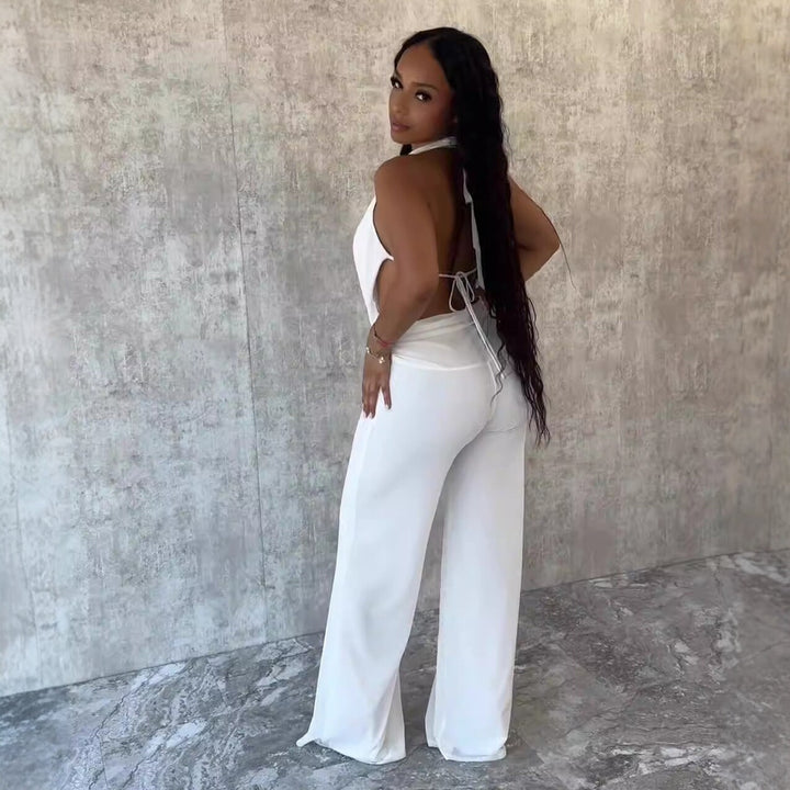 Dame jumpsuit med elegant inverkningsdetalj och vida benpartier Mirla-Eva Jonsson