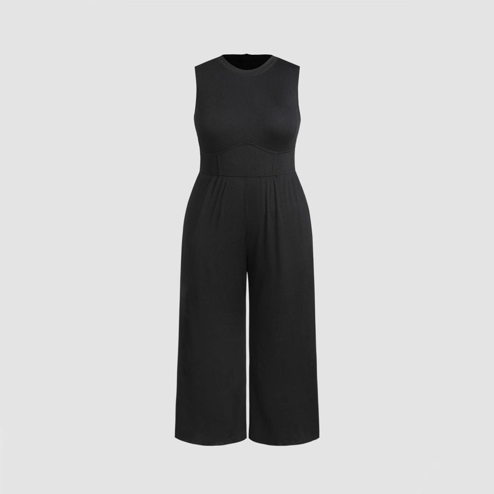 Dame jumpsuit med elegant off-shoulder design och praktiska sidofickor Mirla-Eva Jonsson