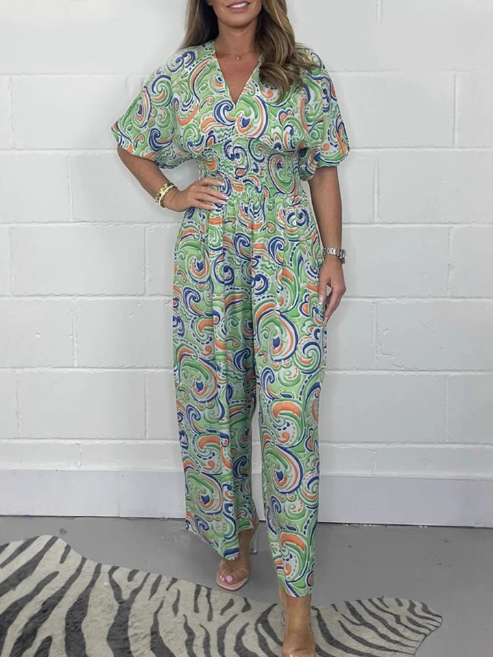 Dame jumpsuit med elegant omslagsöverdel och breda ben Mirla-Eva Jonsson