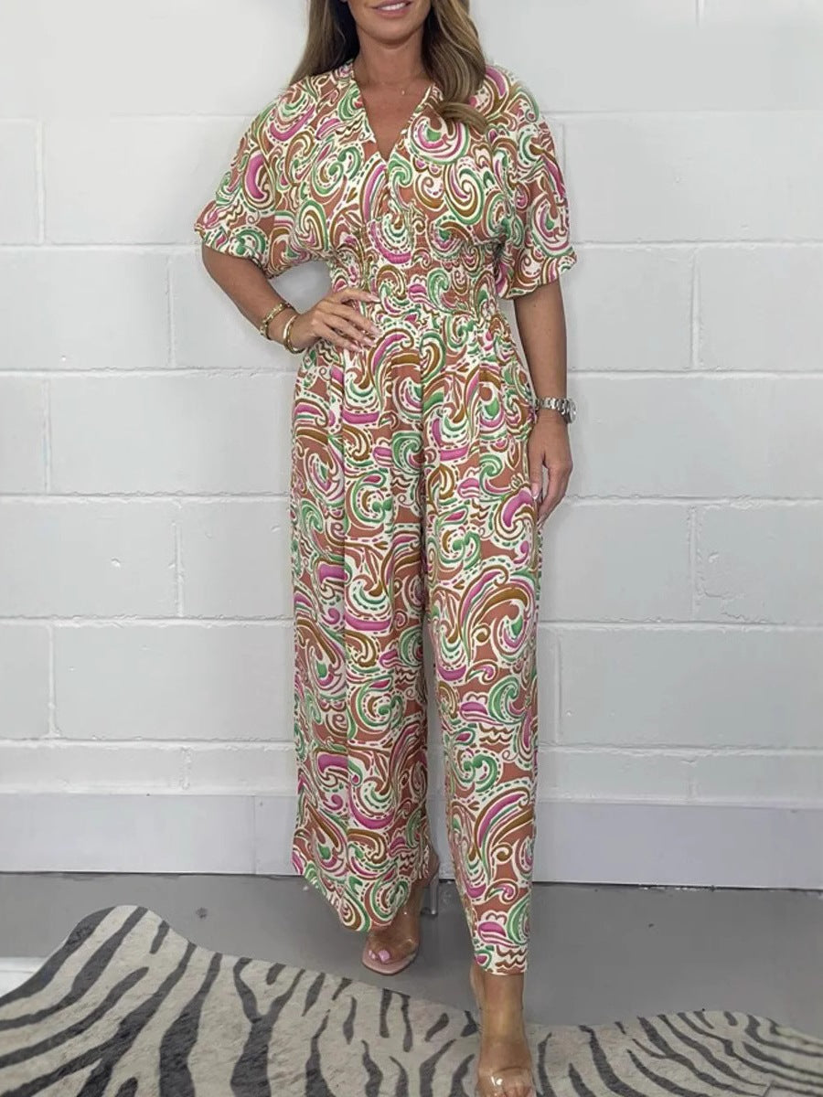 Dame jumpsuit med elegant omslagsöverdel och breda ben Mirla-Eva Jonsson