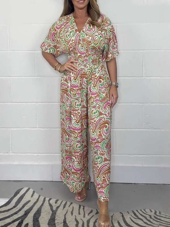 Dame jumpsuit med elegant omslagsöverdel och breda ben Mirla-Eva Jonsson