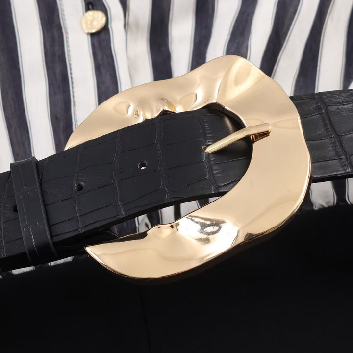 Dame jumpsuit med elegant randmönster och dekorativt bälte Mirla-Eva Jonsson