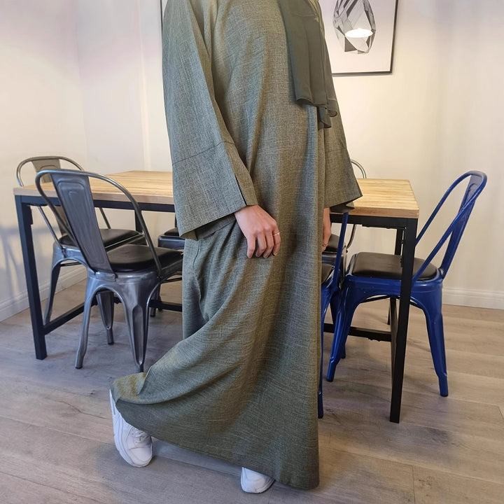 Dame kaftan-klänning med eleganta söm- och ärmdetaljer Mirla-Eva Jonsson