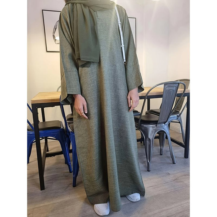Dame kaftan-klänning med eleganta söm- och ärmdetaljer Mirla-Eva Jonsson