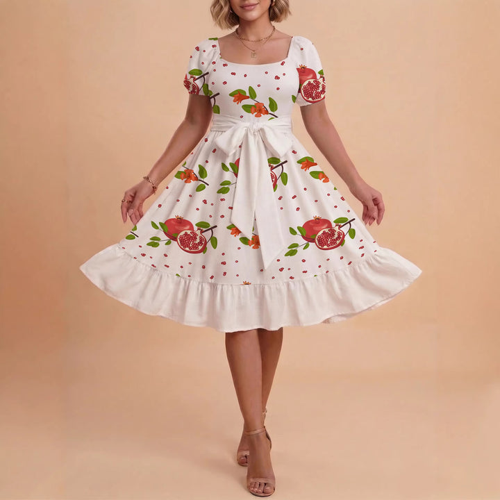 Dame klänning med figursydd snitt och lekfullt blommönster Mirla-Eva Jonsson