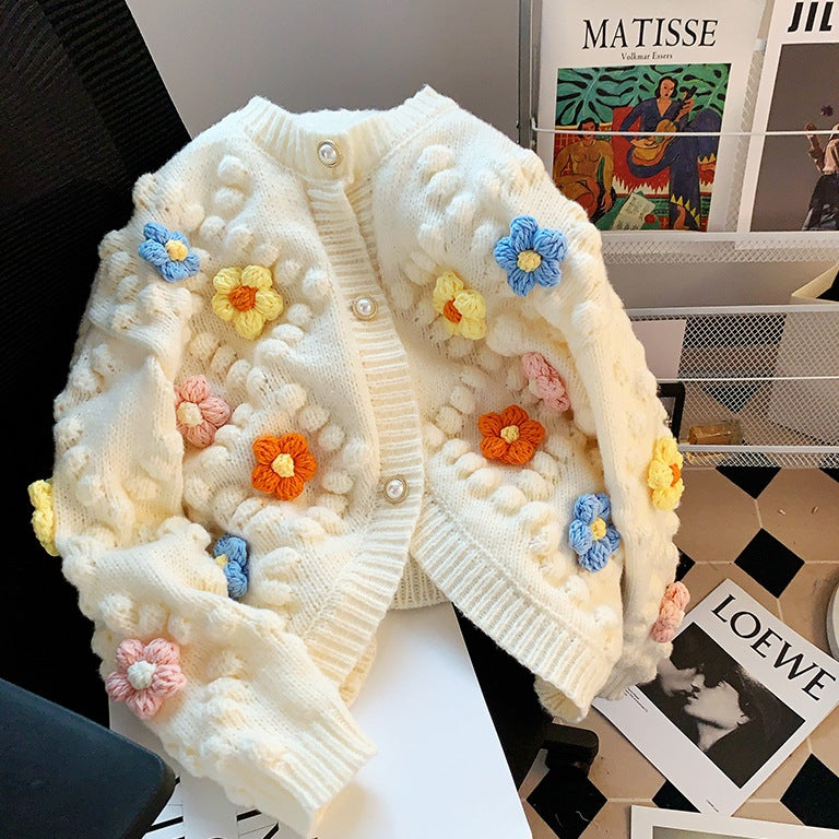 Dame kofta med blomapplikation och knapplås Eva Jonsson-Eva Jonsson