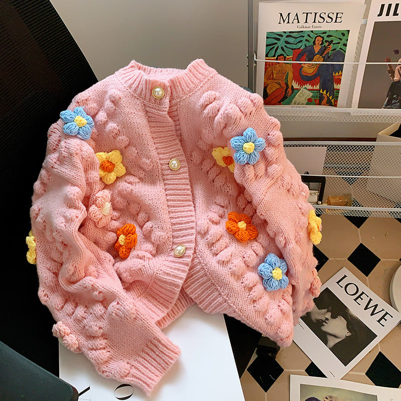 Dame kofta med blomapplikation och knapplås Eva Jonsson-Eva Jonsson