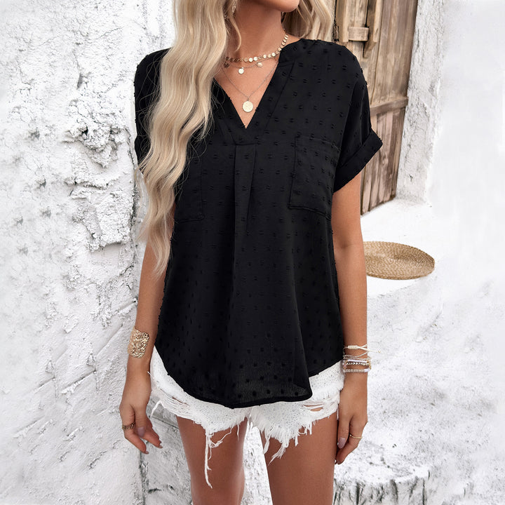 Dame kortärmad blus med fint strukturdesign och elegant knapprad Mirla-Eva Jonsson