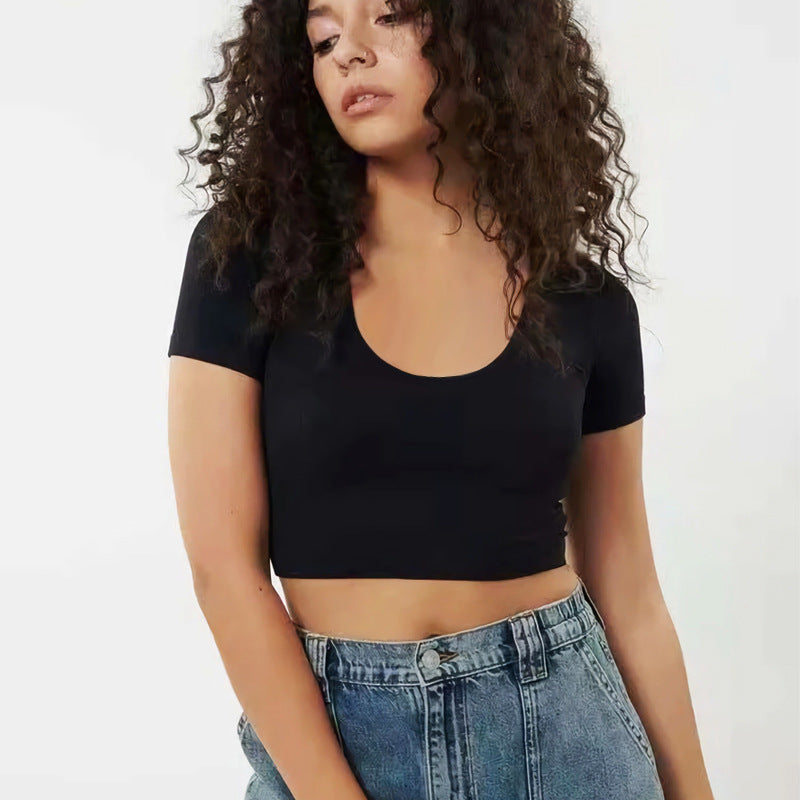 Dame kortärmad crop-top med rundhalsringning och figurnära passform Mirla-Eva Jonsson