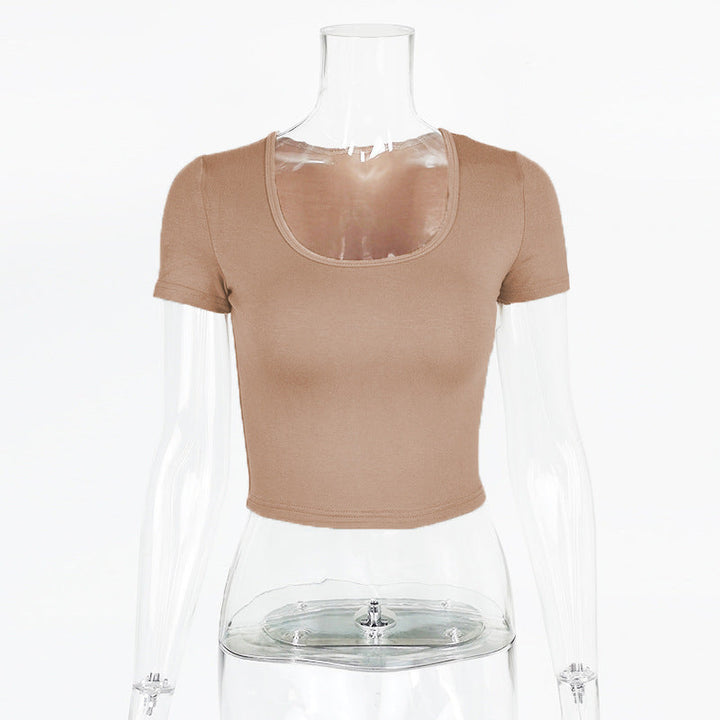 Dame kortärmad crop-top med rundhalsringning och figurnära passform Mirla-Eva Jonsson